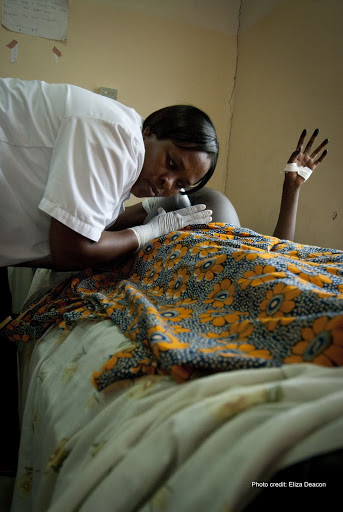midwife helping patient